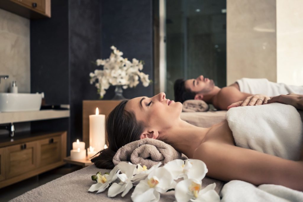 man-and-woman-getting-couples-massage
